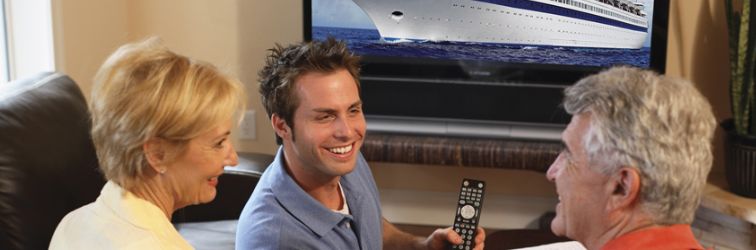 Guy showing remote with ship on screen